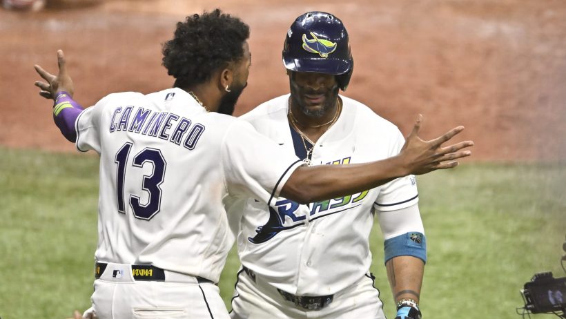 The Rays celebrate a Yandy Diaz home run vs the Guardians.