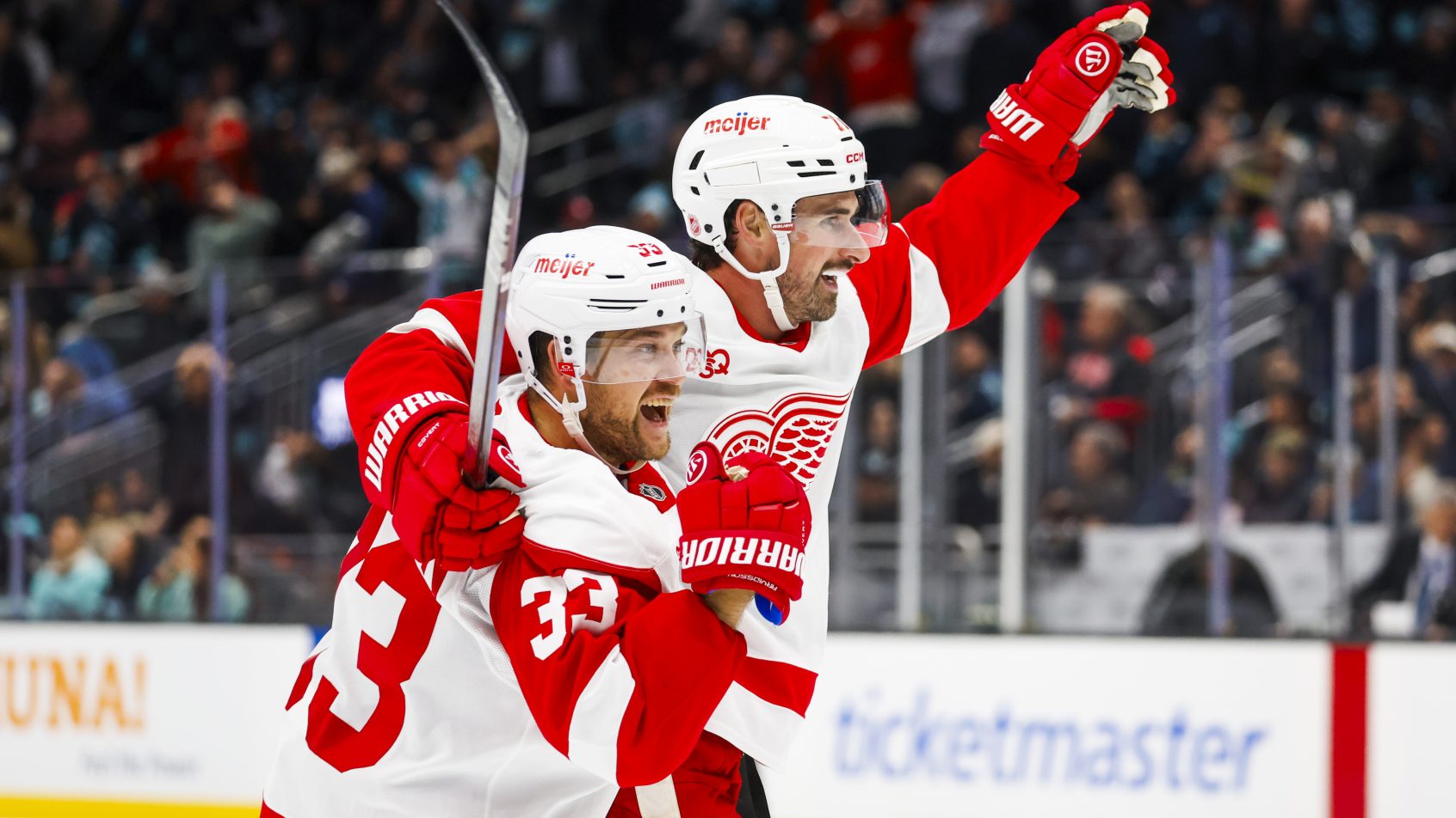 Dylan Larkin and Viktor Arvidsson celebrate goal