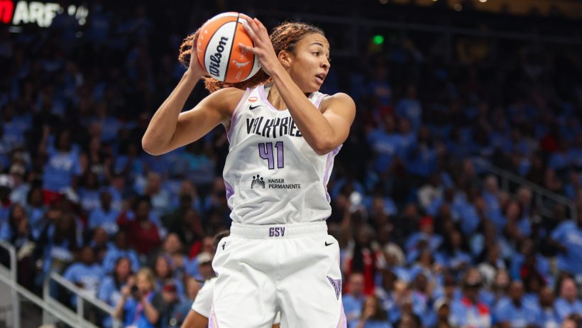 Kiah Stokes grabs a rebound vs Atlanta during the WNBA Finals.