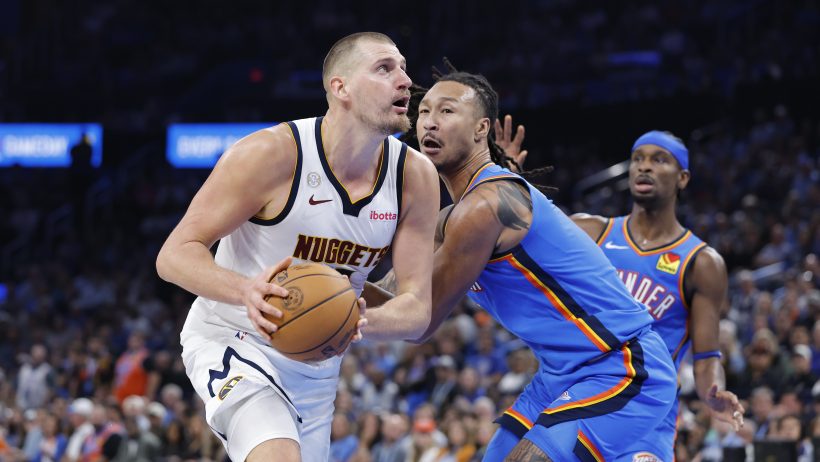 Nikola Jokic drives to the hoop vs the Thunder.