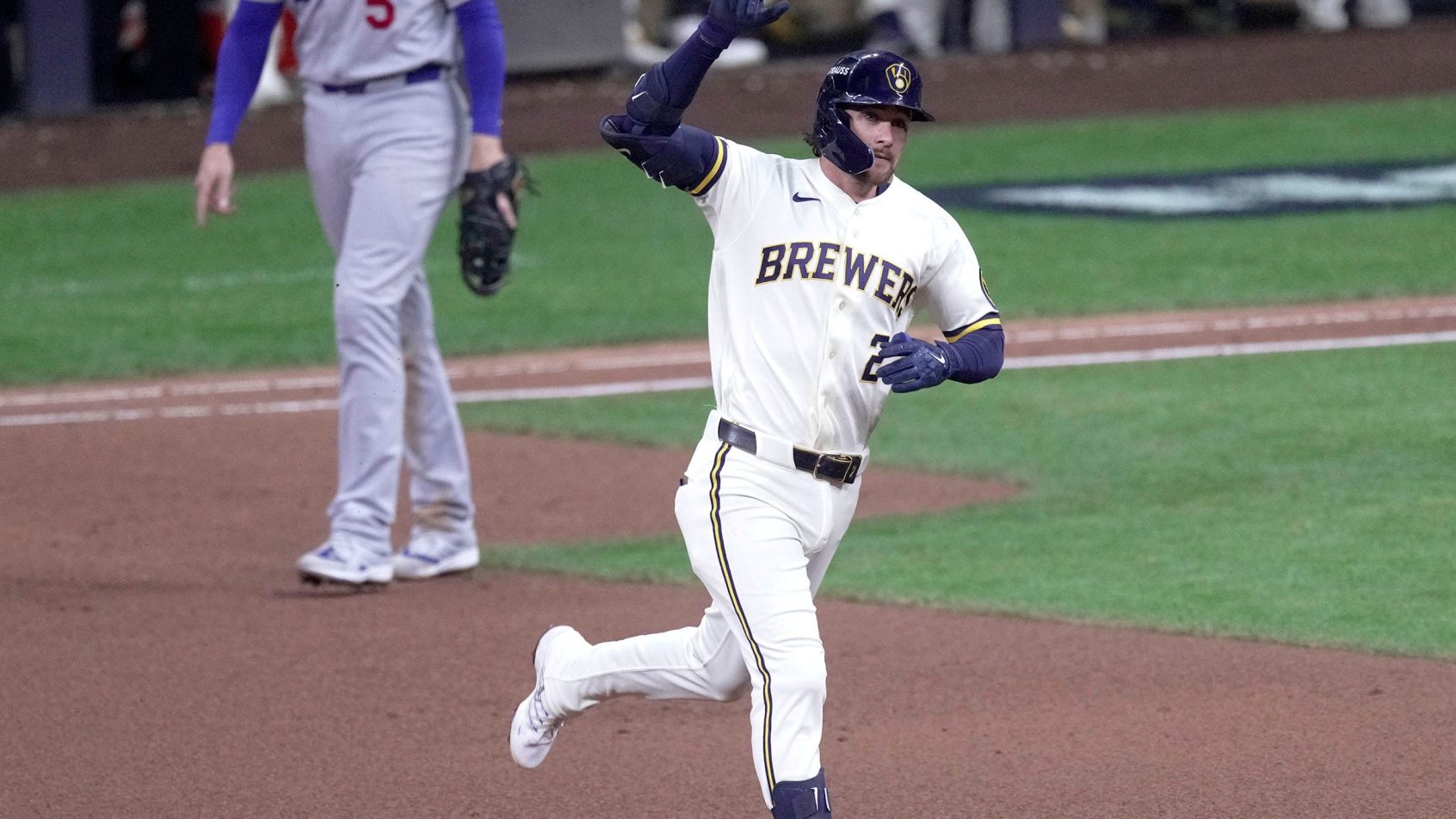Brice Turang rounding the bases