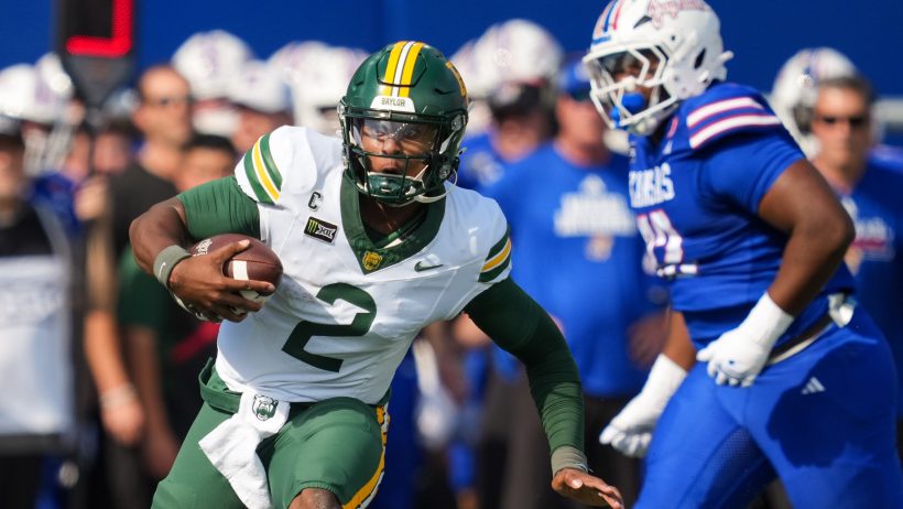DJ Lagway scrambles against Kansas.