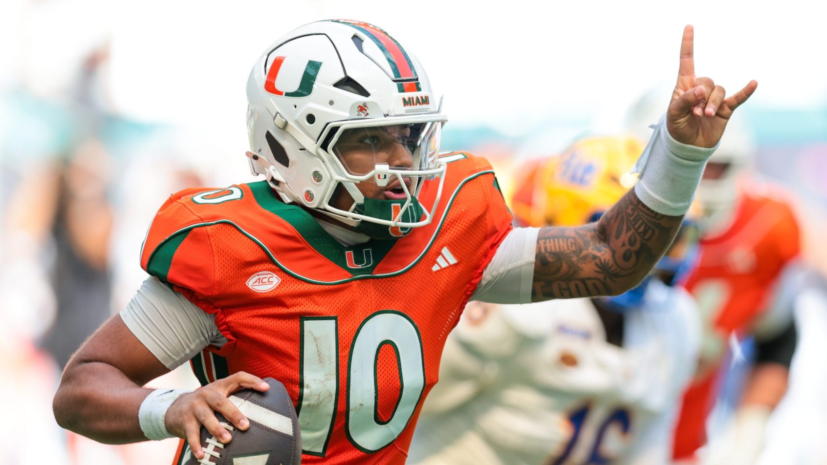 Darian Mensah scrambles for Miami in a game vs Pitt.