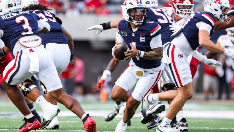Arizona quarterback Noah Fifita looks downfield against Iowa State