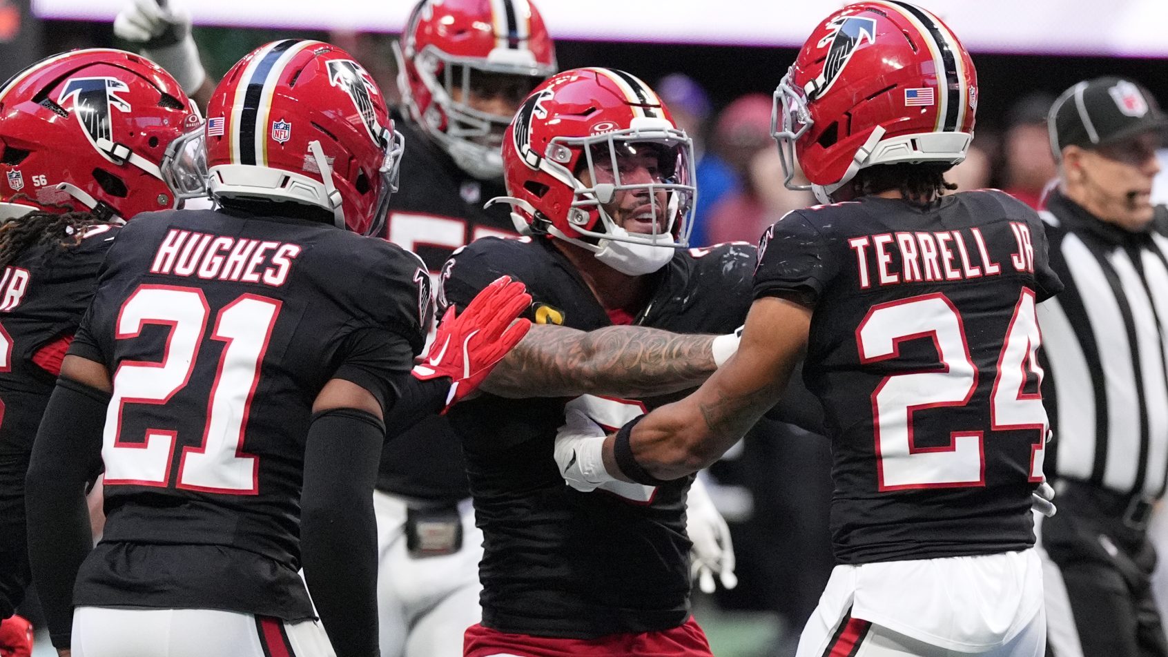 Atlanta Falcons defenders celebrating