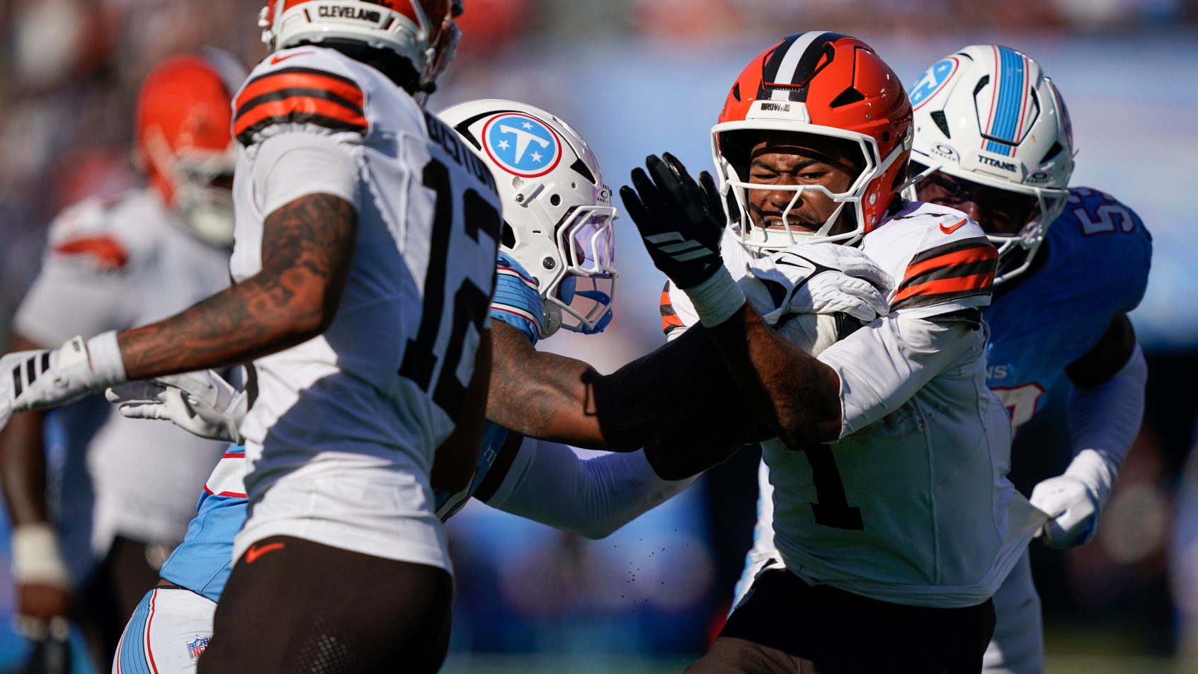 Browns receiver KC Concepcion carries the ball against the Titans