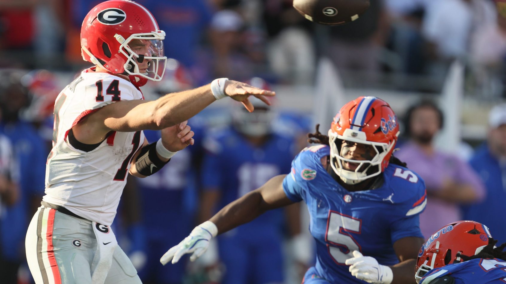 Georgia quarterback Gunner Stockton throws under pressure against Florida.