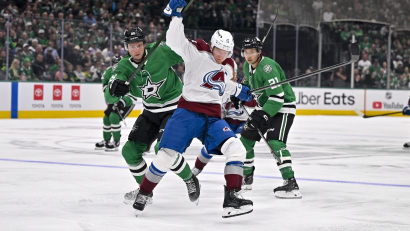 Colorado Avalanche forward T.J. Hughes plays the puck against the Dallas Stars