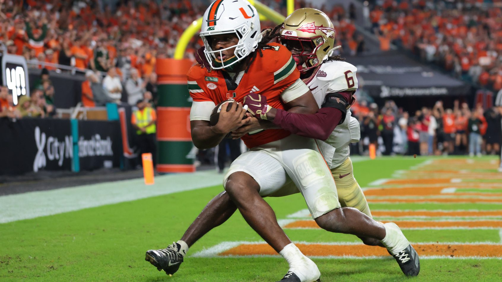Miami receiver Malachi Toney catches a touchdown against Florida State