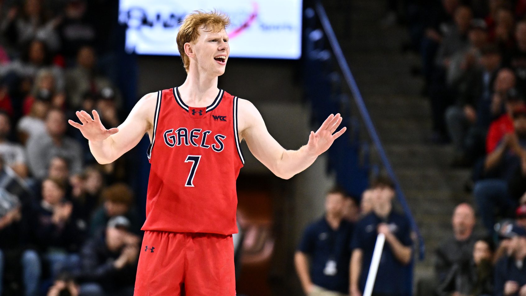 Saint Mary's Gaels guard Joshua Dent calms the bench