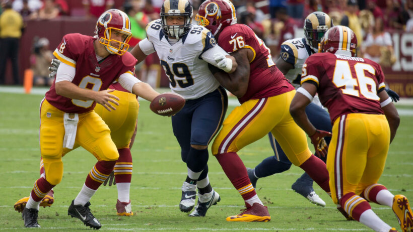 Rams DT Aaron Donald breaking through the offensive line