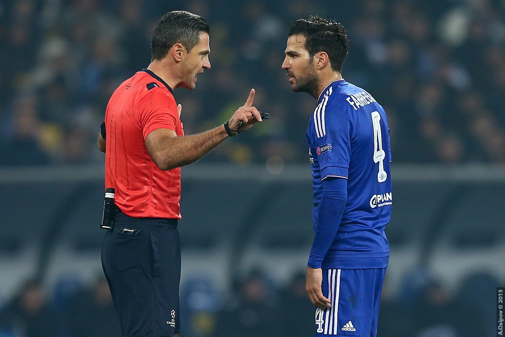 Fabregas arguing with the referee
