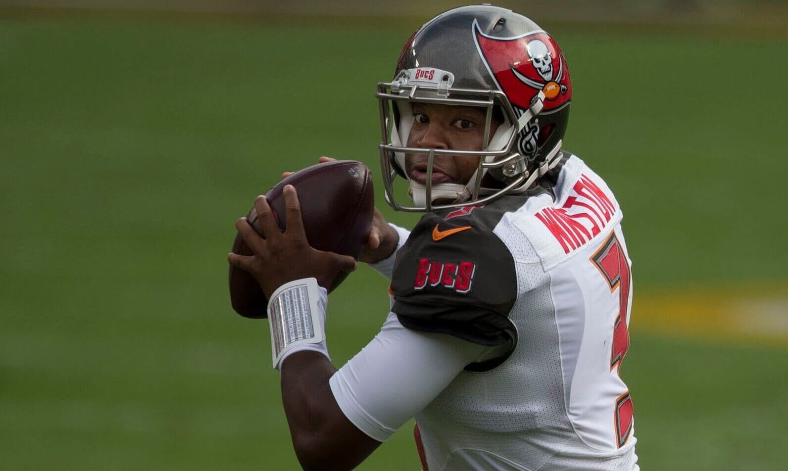 Jameis Winston dropping back to pass.