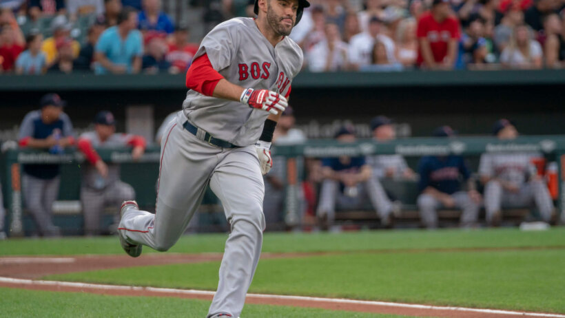 JD Martinez getting a hit during an August game against the Baltimore Orioles