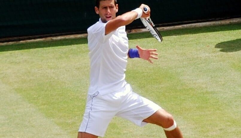 Novak Djokovic hits a return shot.