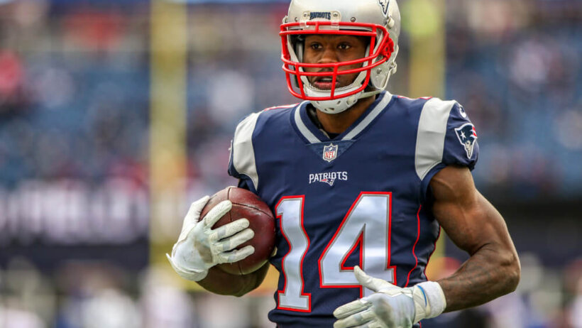 Brandin Cooks carrying a football