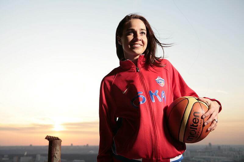 Becky Hammon holding basketball