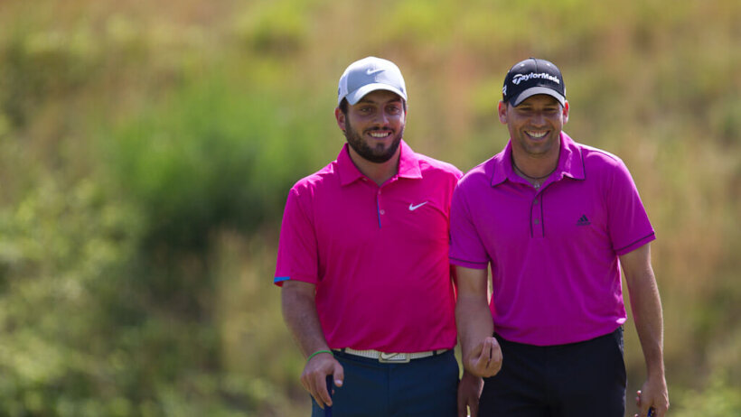 Francesco Molinari walking to his ball