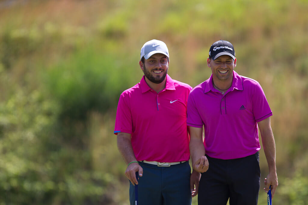 Francesco Molinari walking to his ball
