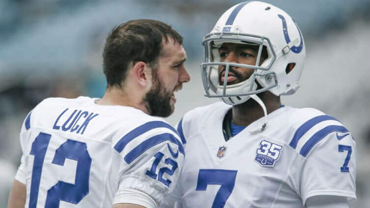 Andrew Luck talking to Jacoby Brissett