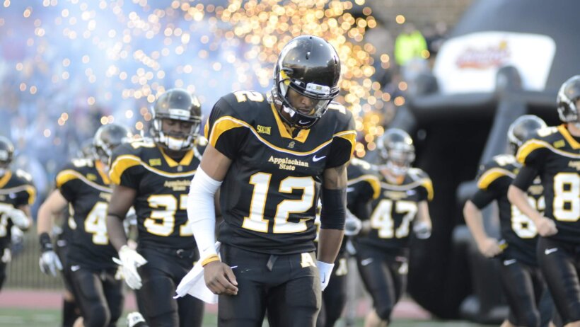 App State football team taking the field