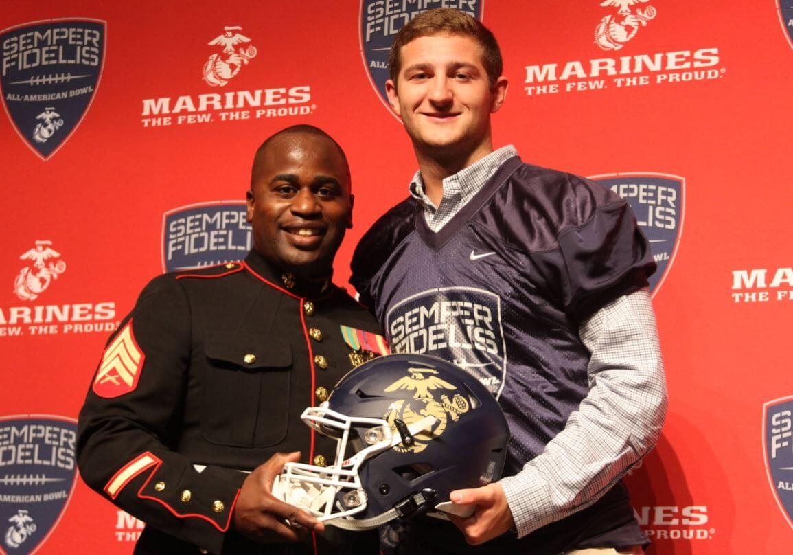 Austin Kendall receiving his Semper Fidelis All-American Bowl jersey in 2015.