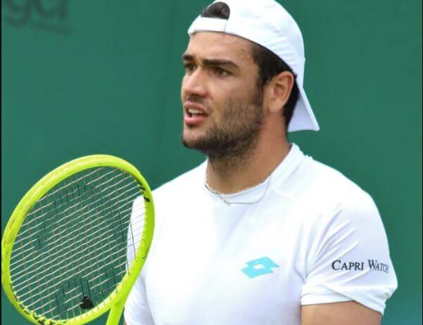 Matteo Berrettini waiting to return a serve.