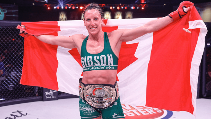 Julia Budd celebrates in the octagon.