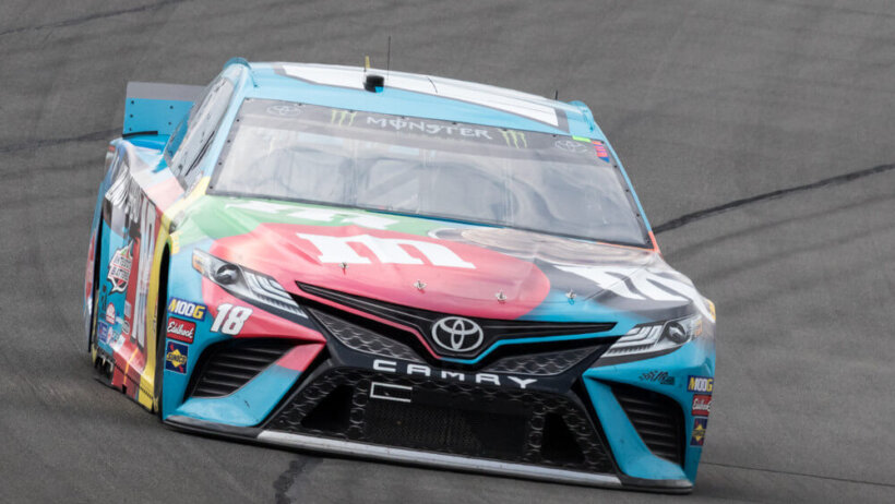 Kyle Busch races into turn 1 during the Pocono 400 at Pocono Raceway in Long Pond, PA