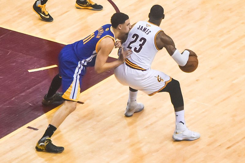 LeBron James backs down Klay Thompson