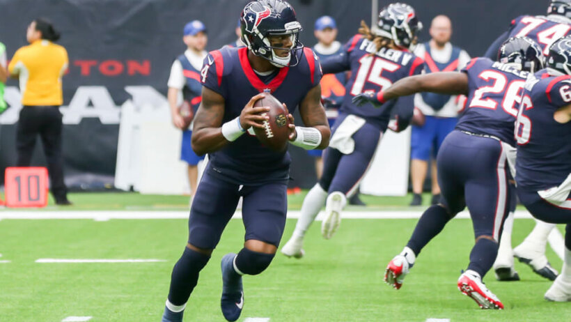 Deshaun Watson of the Houston Texans rolling out to throw