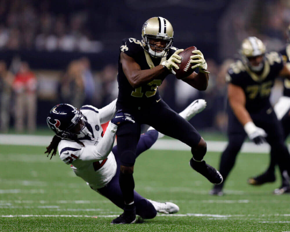 New Orleans Saints WR Michael Thomas running with football