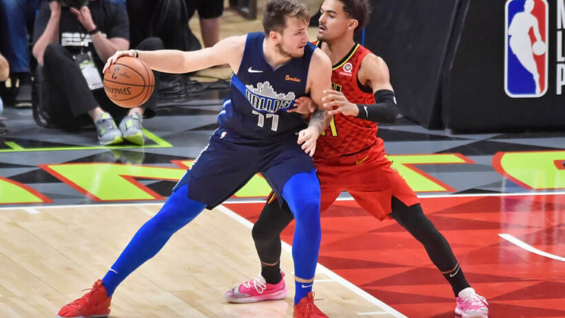 Doncic backing down Young