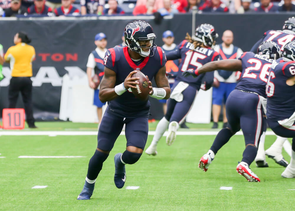 Houston Texans quarterback Deshaun Watson looks for an opening to pass the ball