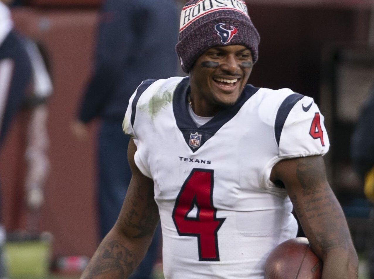 Deshaun Watson smiling on the field post game