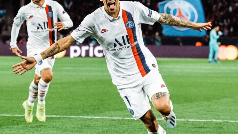 Angel Di Maria celebrates wildly after hitting the target for PSG against Real Madrid