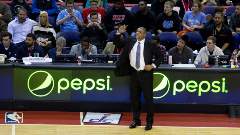 Doc RIvers coach of LA Clippers courtside
