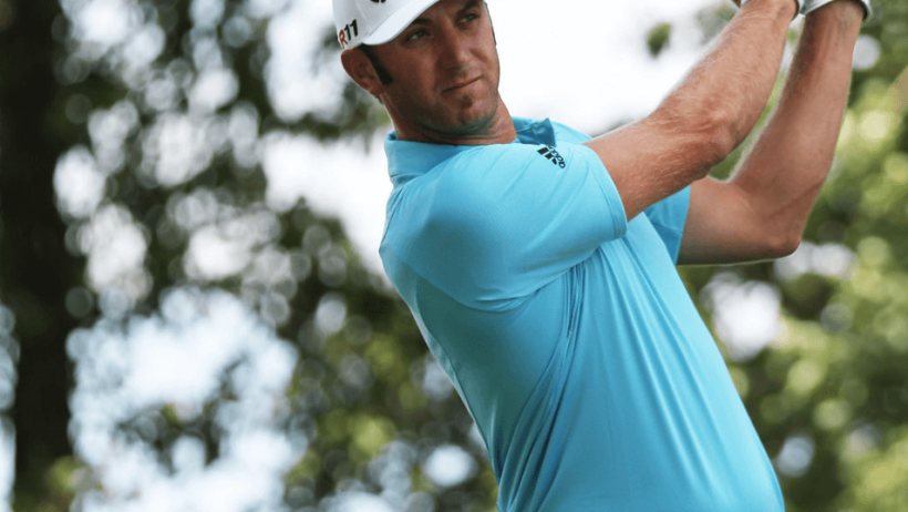Dustin Johnson hitting an iron shot.