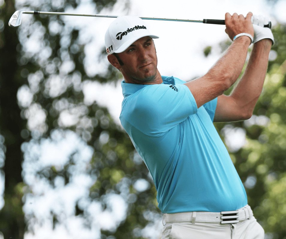 Dustin Johnson hitting an iron shot.