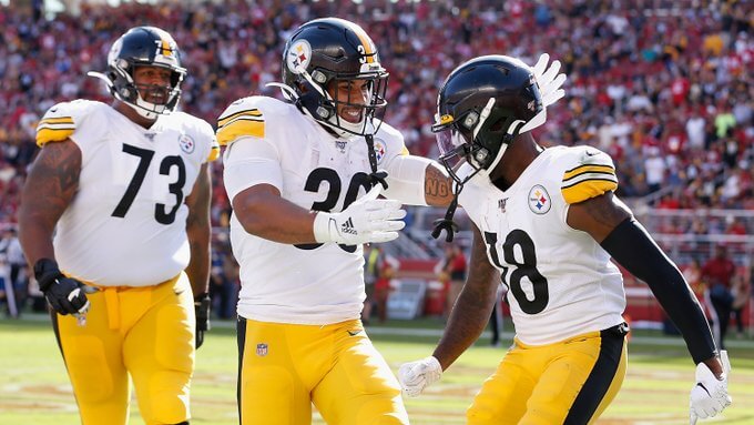 James Conner celebrating with teammates