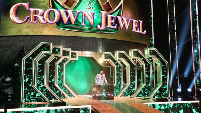 Tyson Fury speaking under a Crown Jewel setup