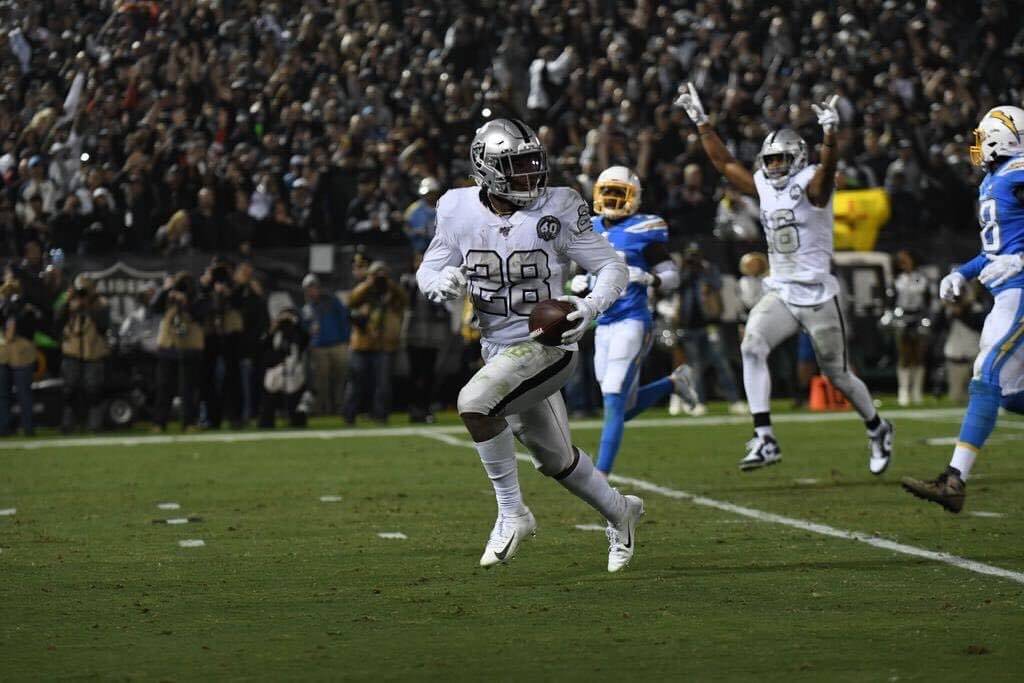 Josh Jacobs scoring a TD