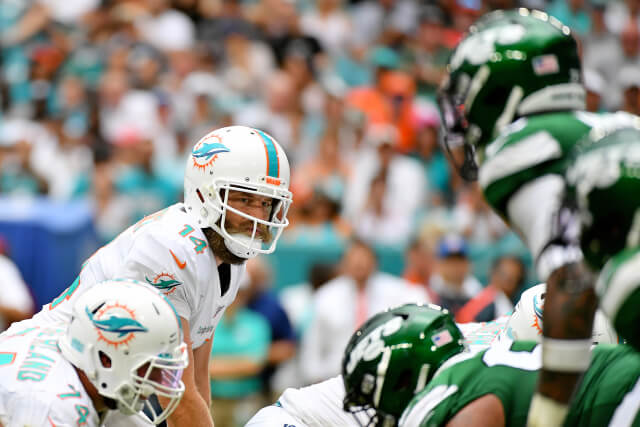 Ryan Fitzpatrick under center at the line of scrimmage against the Jets