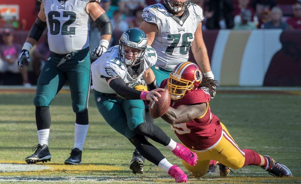 Philadelphia Eagles QB Carson Wentz getting tackled.