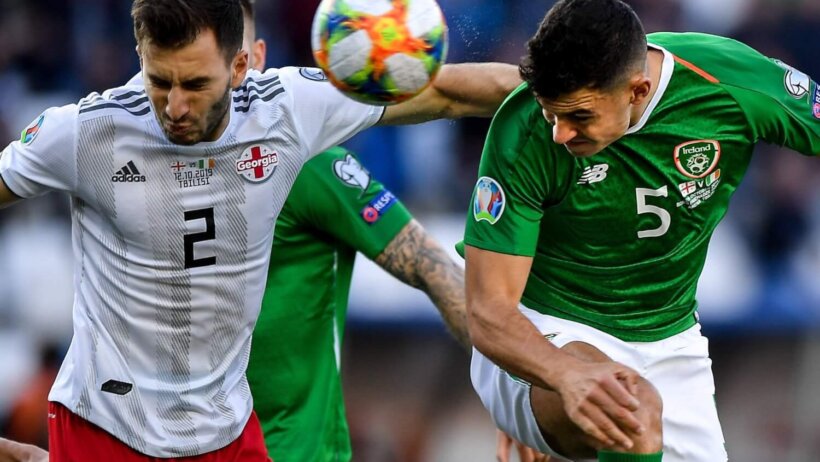 John Egan attempts a header at goal for the Republic of Ireland