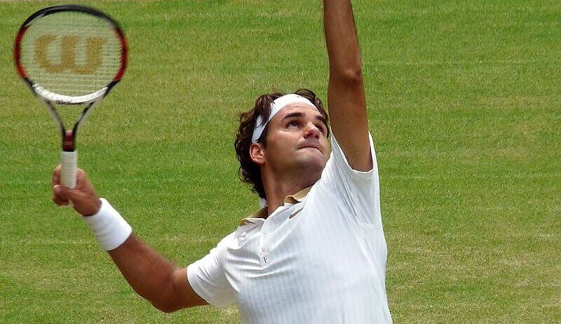 Roger Federer serves at Wimbledon