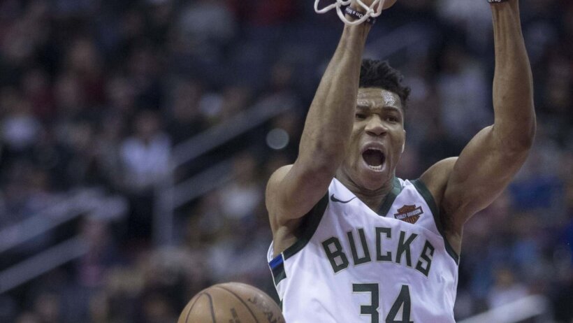 Giannis Antetokounmpo dunks