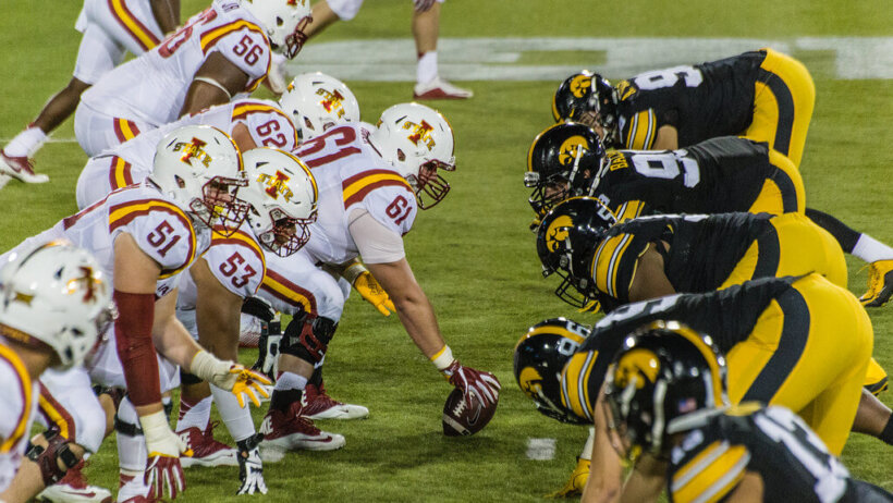 Iowa State and Iowa on the line of scrimmage