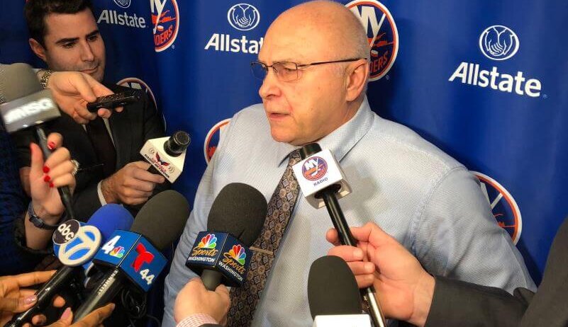 Islanders coach Barry Trotz answering questions from the media.