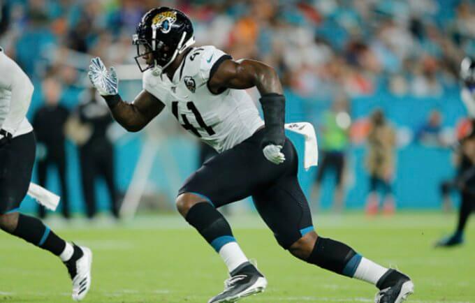 Josh Allen of the Jaguars rushing the passer off the edge
